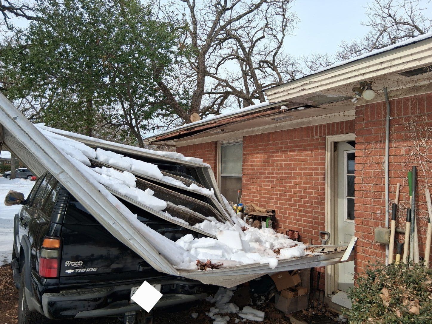 Gallery photos for Dealing with Winter Storm Damage - Roof and Driveway Cover Repair: Image #1