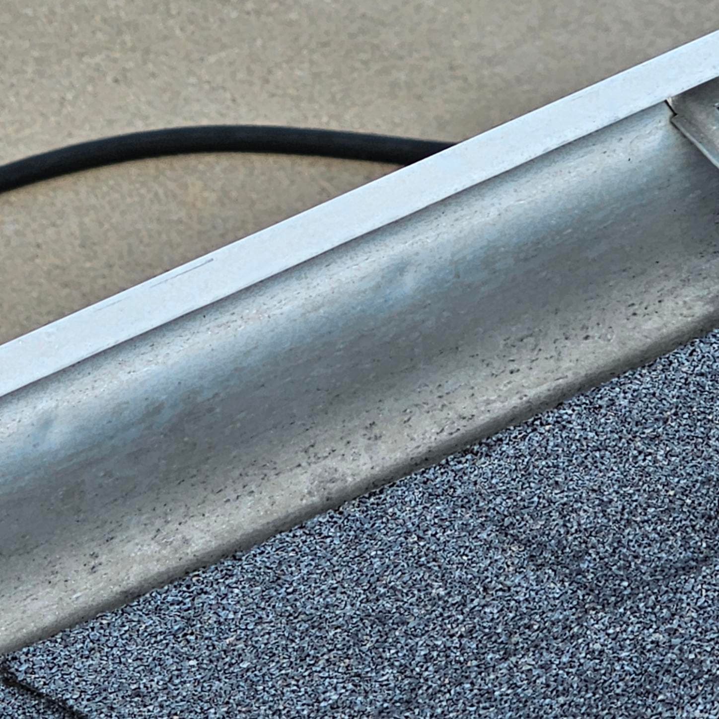 Seamless Gutter Inspection by Rooftop Solutions image