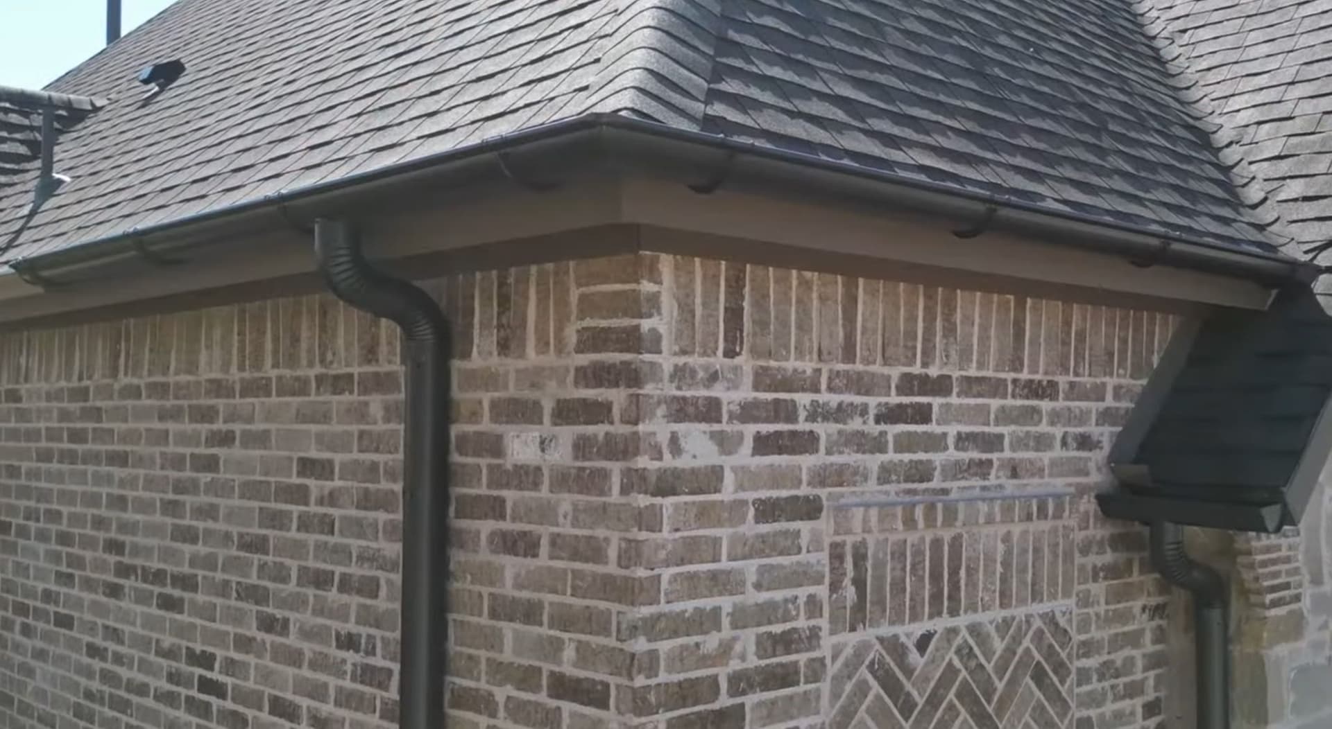 Sleek Half-Round Gutters Installed on Modern Home
